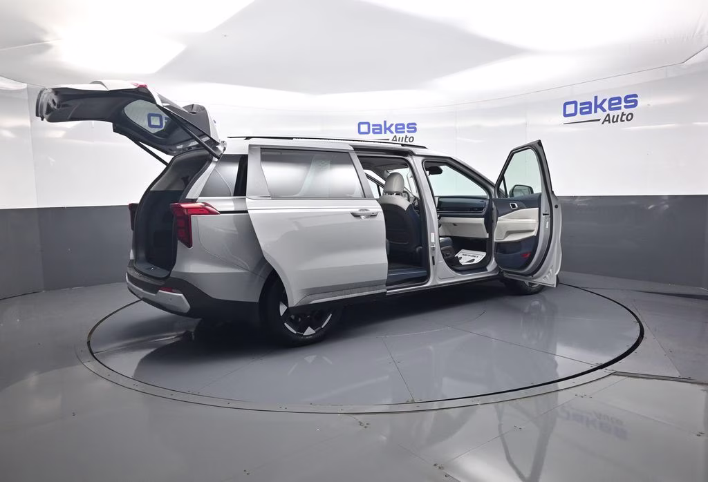 2026 Ceramic Silver Kia Carnival EX FWD Van
