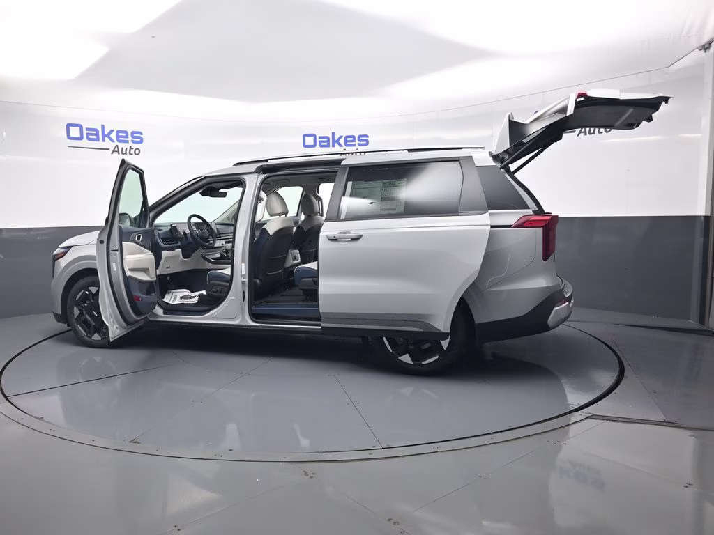2026 Ceramic Silver Kia Carnival EX FWD Van