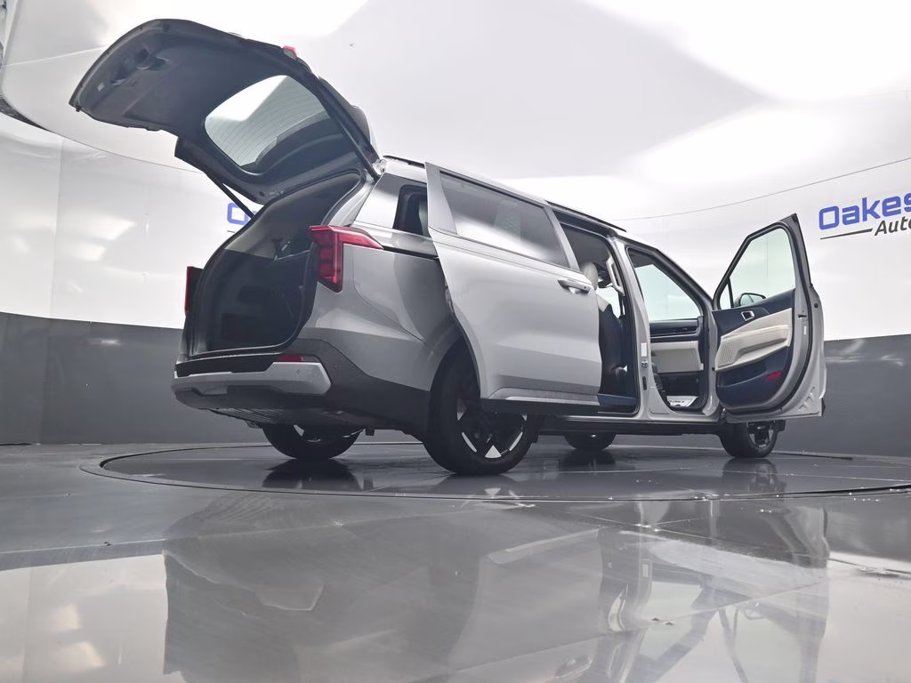 2026 Ceramic Silver Kia Carnival EX FWD Van