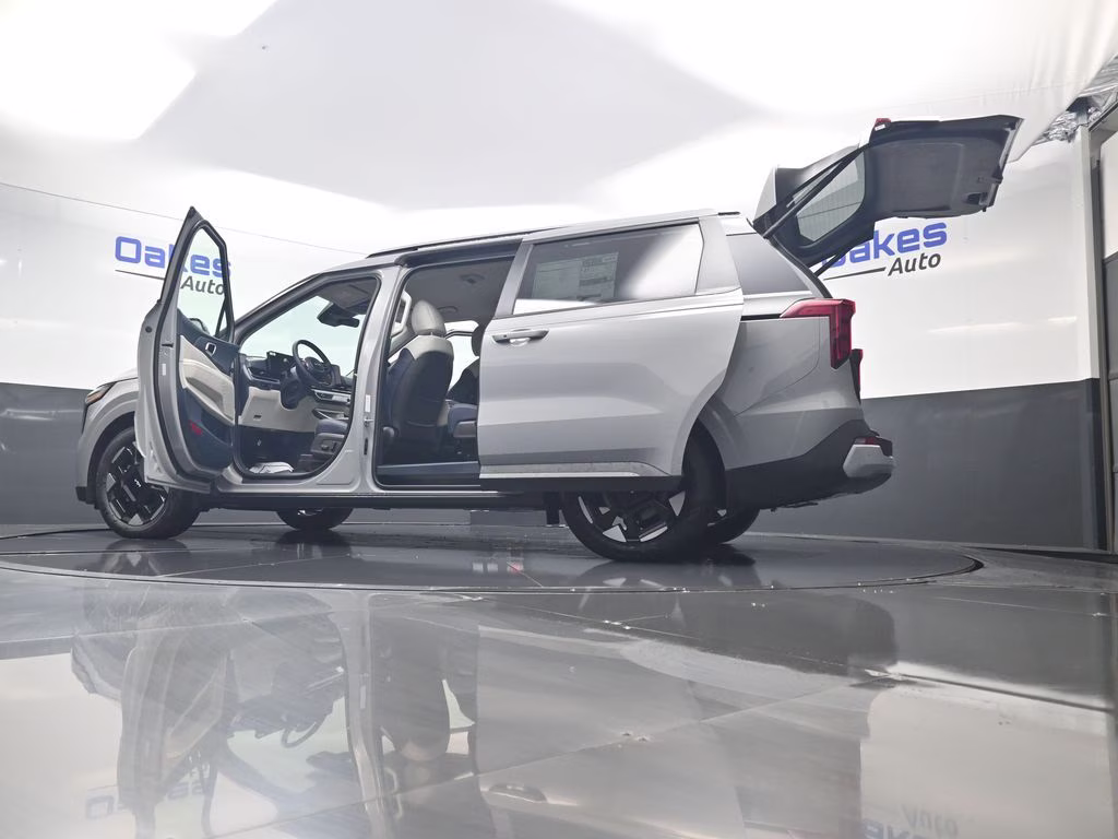 2026 Ceramic Silver Kia Carnival EX FWD Van