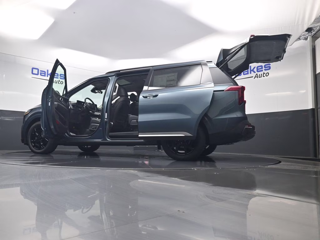 2026 Astra Blue Kia Carnival Hybrid SX FWD Van