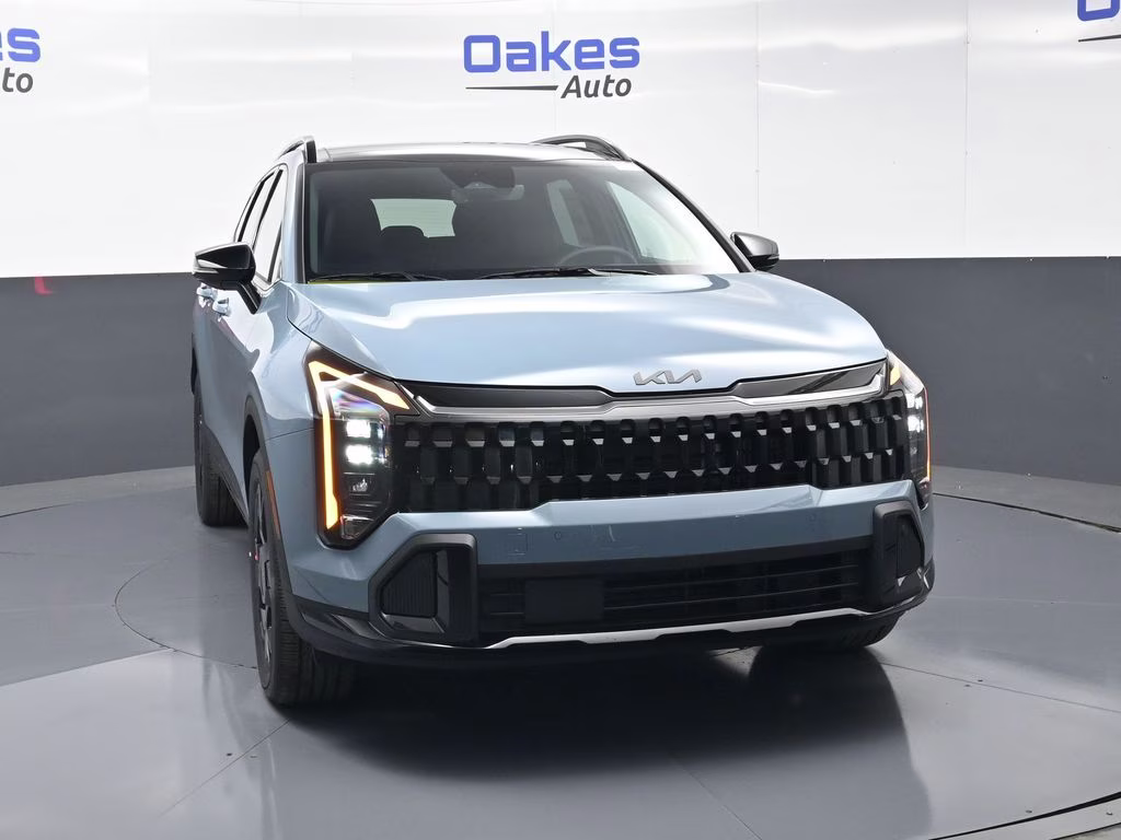 2026 Heritage Blue Kia Sportage Hybrid X-Line AWD SUV