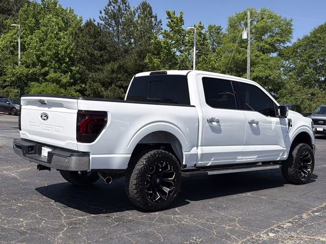 2024 Star White Metallic Tri-Coat Ford F-150 Lariat 4X4 Truck