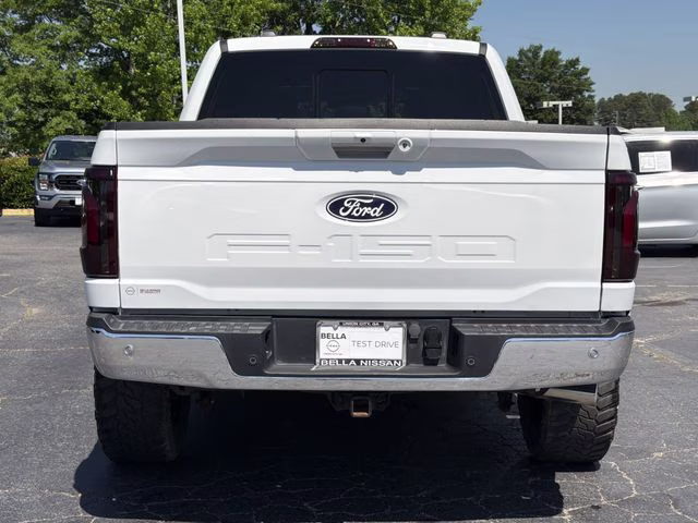 2024 Star White Metallic Tri-Coat Ford F-150 Lariat 4X4 Truck