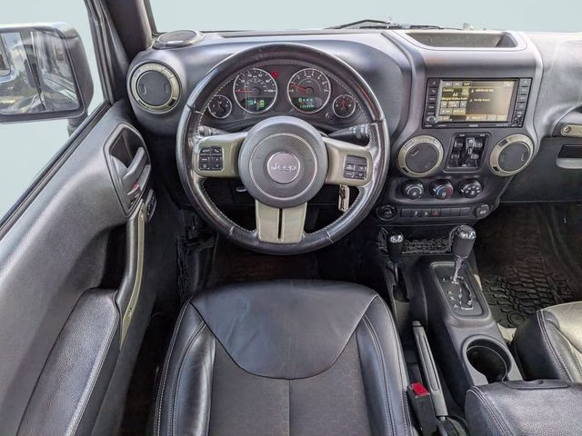 2016 Rhino Clearcoat Jeep Wrangler Unlimited Freedom Edition 4X4 SUV