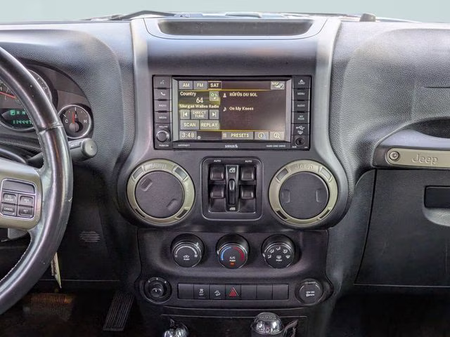 2016 Rhino Clearcoat Jeep Wrangler Unlimited Freedom Edition 4X4 SUV