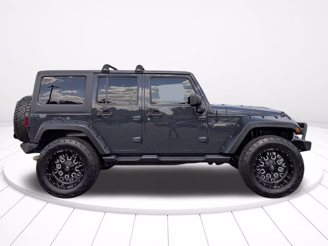 2016 Rhino Clearcoat Jeep Wrangler Unlimited Freedom Edition 4X4 SUV