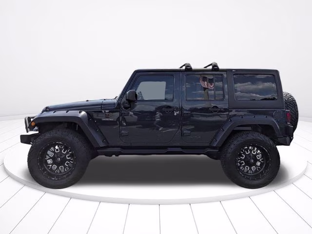 2016 Rhino Clearcoat Jeep Wrangler Unlimited Freedom Edition 4X4 SUV