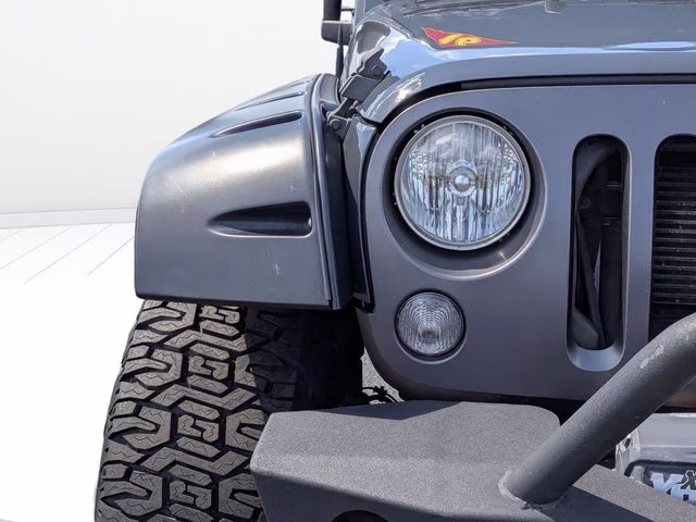 2016 Rhino Clearcoat Jeep Wrangler Unlimited Freedom Edition 4X4 SUV