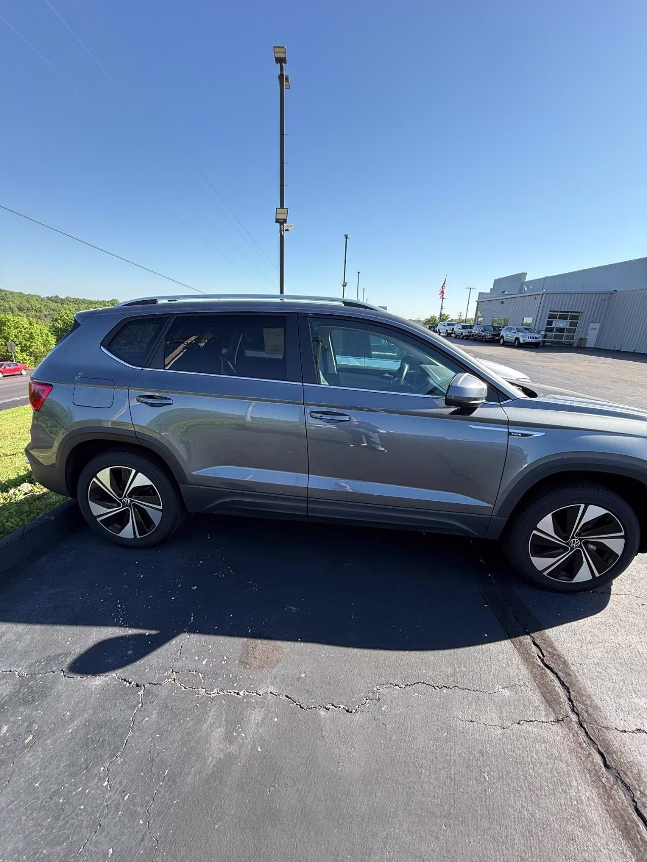 2024 GRAY Volkswagen Taos 1.5T SE AWD SUV