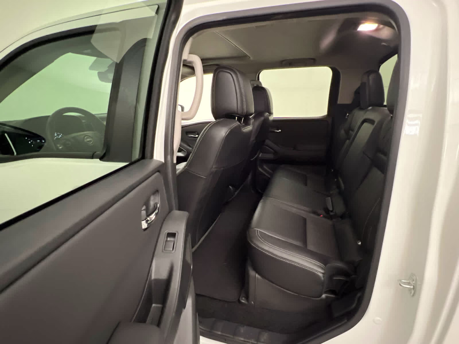 2024 Glacier White Nissan Frontier SL RWD Truck