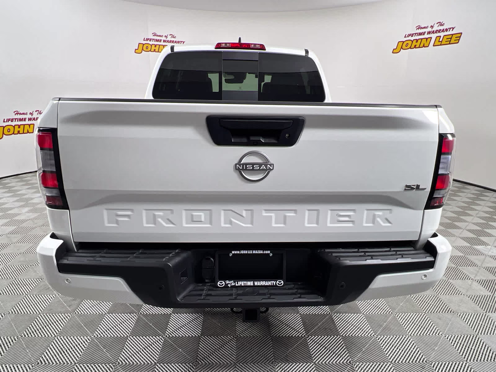 2024 Glacier White Nissan Frontier SL RWD Truck