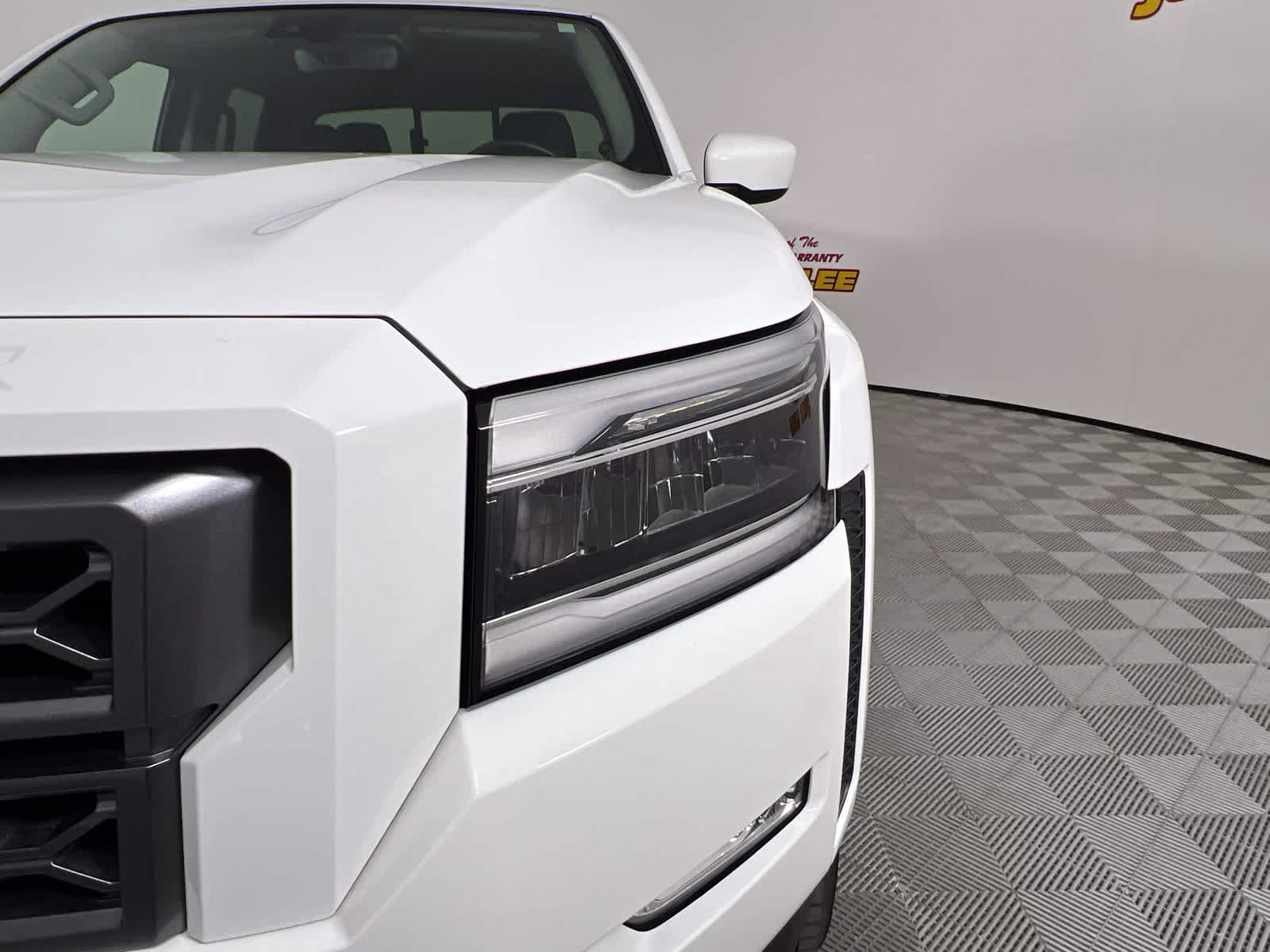 2024 Glacier White Nissan Frontier SL RWD Truck