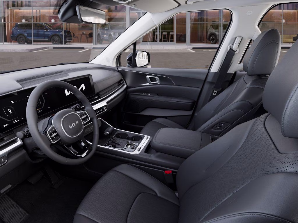 2026 Ivory Silver Kia Carnival SX FWD Van