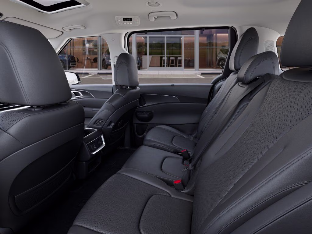2026 Ivory Silver Kia Carnival SX FWD Van