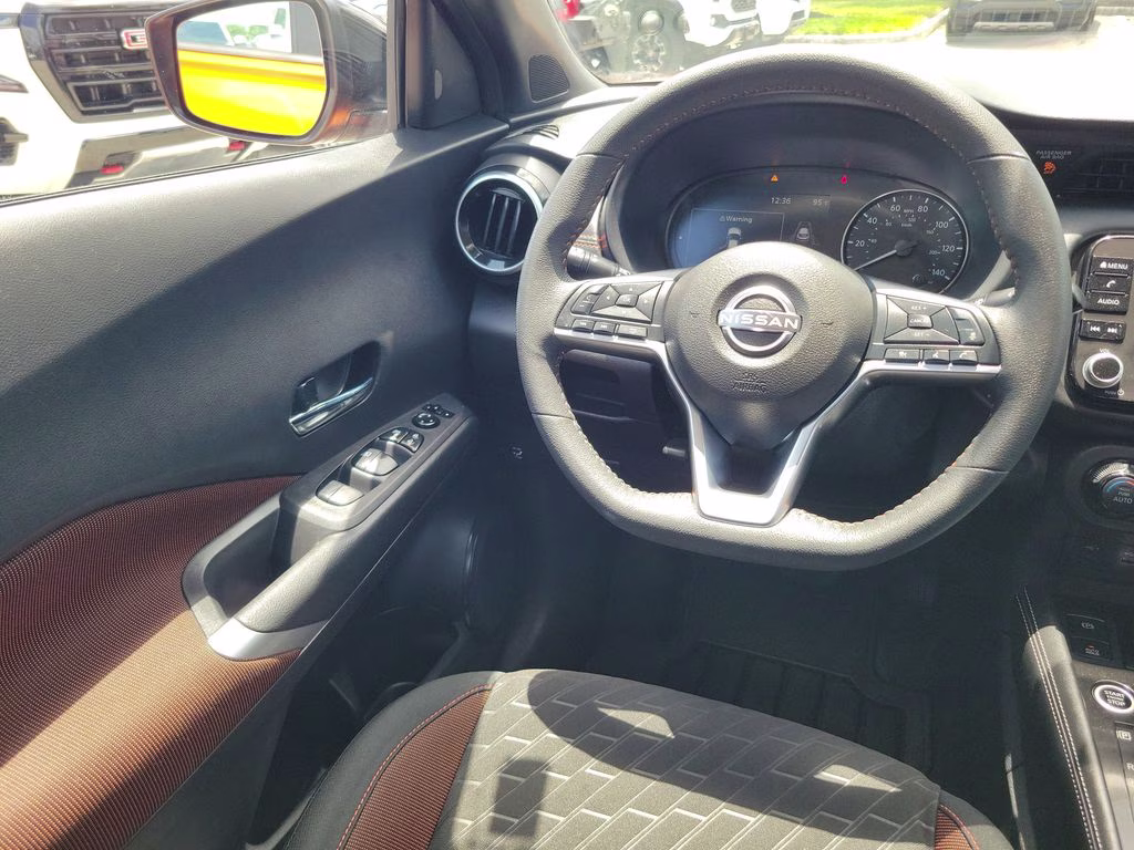 2023 Monarch Orange Metallic/Super Black Nissan Kicks SR FWD SUV