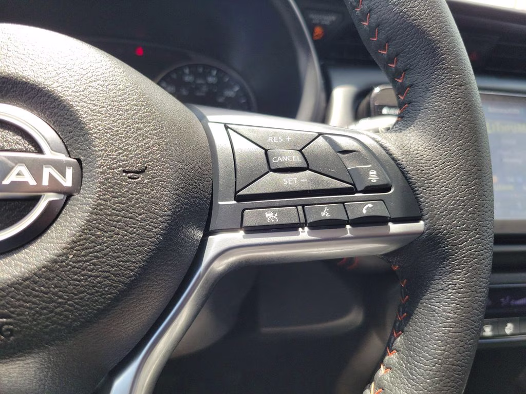2023 Monarch Orange Metallic/Super Black Nissan Kicks SR FWD SUV