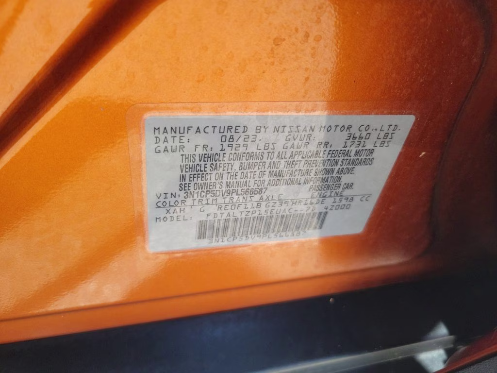 2023 Monarch Orange Metallic/Super Black Nissan Kicks SR FWD SUV