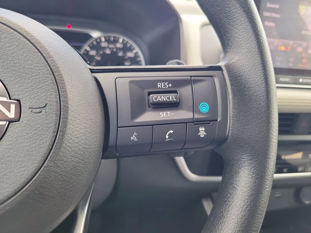 2023 Pearl White Tricoat Nissan Rogue SV FWD SUV