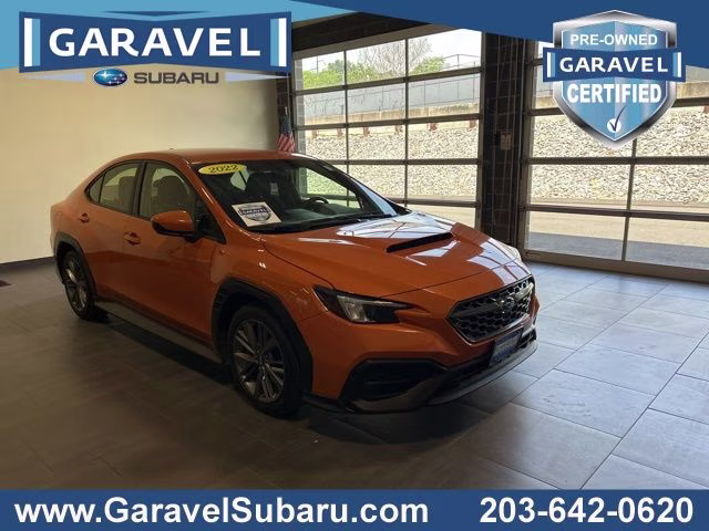 2022 Solar Orange Pearl Subaru WRX Base AWD Sedan