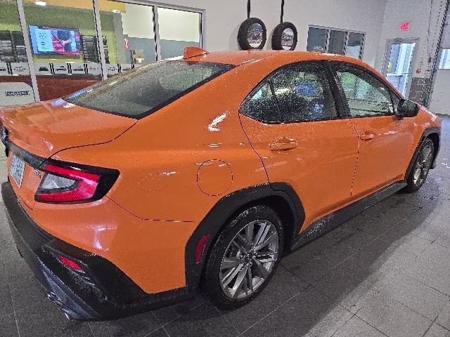 2022 Solar Orange Pearl Subaru WRX Base AWD Sedan