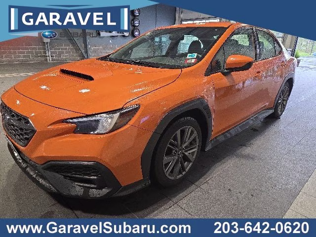 2022 Solar Orange Pearl Subaru WRX Base AWD Sedan