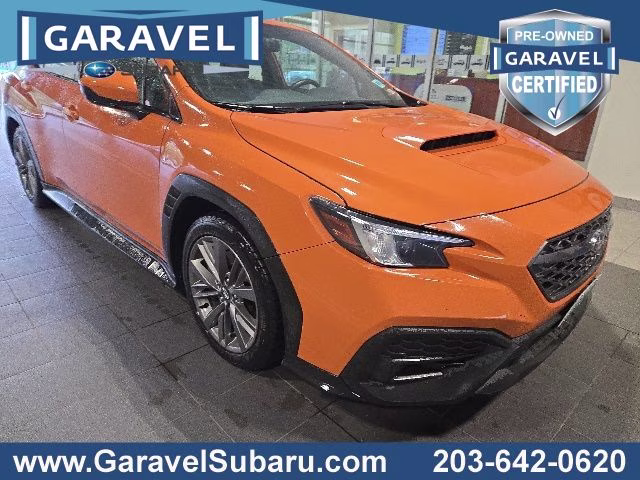 2022 Solar Orange Pearl Subaru WRX Base AWD Sedan