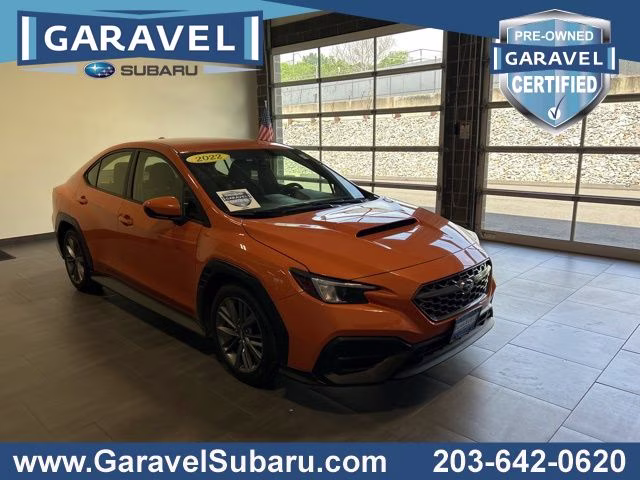 2022 Solar Orange Pearl Subaru WRX Base AWD Sedan