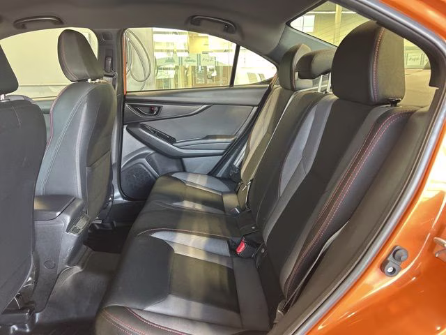2022 Solar Orange Pearl Subaru WRX Base AWD Sedan