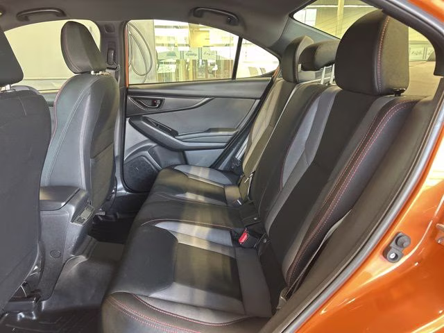 2022 Solar Orange Pearl Subaru WRX Base AWD Sedan