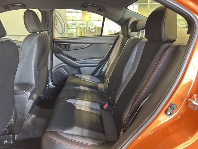 2022 Solar Orange Pearl Subaru WRX Base AWD Sedan