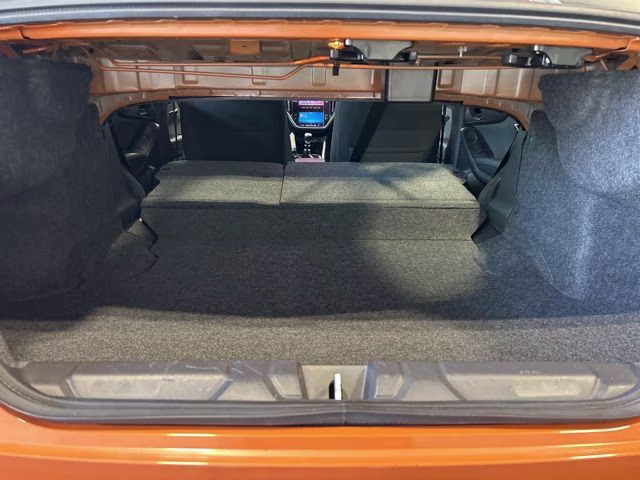 2022 Solar Orange Pearl Subaru WRX Base AWD Sedan