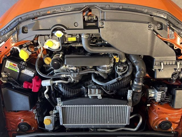 2022 Solar Orange Pearl Subaru WRX Base AWD Sedan