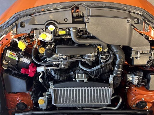 2022 Solar Orange Pearl Subaru WRX Base AWD Sedan