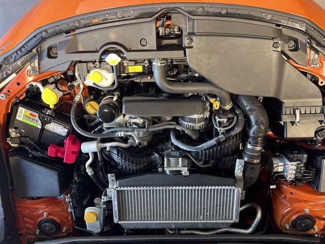 2022 Solar Orange Pearl Subaru WRX Base AWD Sedan