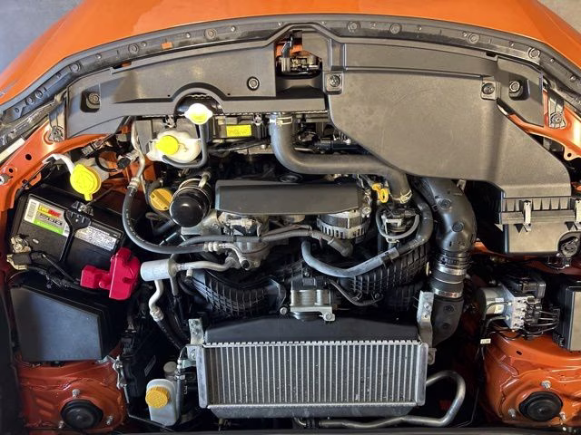 2022 Solar Orange Pearl Subaru WRX Base AWD Sedan