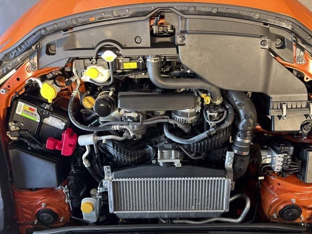 2022 Solar Orange Pearl Subaru WRX Base AWD Sedan