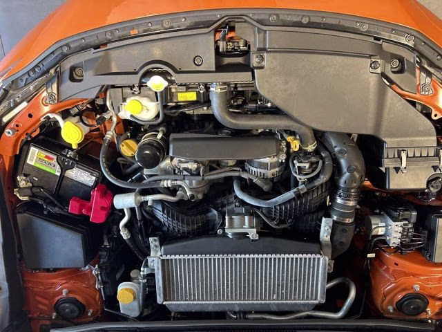 2022 Solar Orange Pearl Subaru WRX Base AWD Sedan