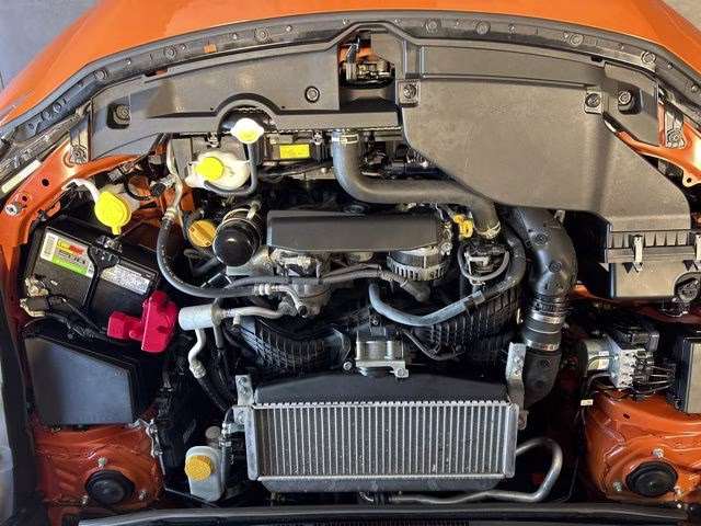 2022 Solar Orange Pearl Subaru WRX Base AWD Sedan
