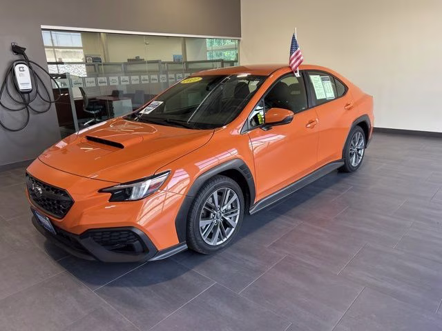 2022 Solar Orange Pearl Subaru WRX Base AWD Sedan