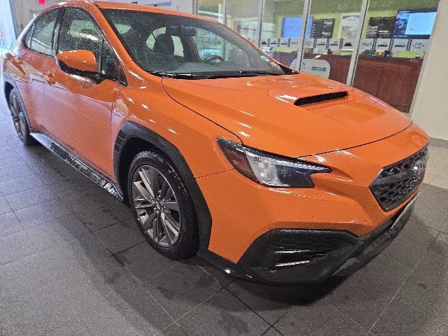 2022 Solar Orange Pearl Subaru WRX Base AWD Sedan