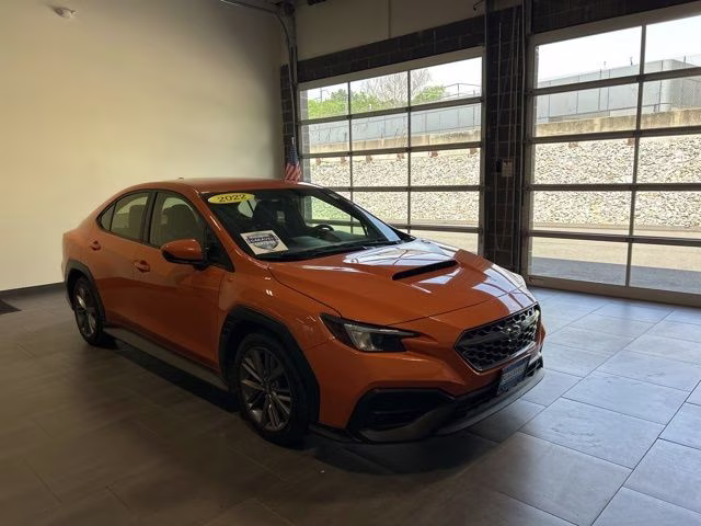 2022 Solar Orange Pearl Subaru WRX Base AWD Sedan