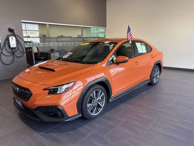 2022 Solar Orange Pearl Subaru WRX Base AWD Sedan