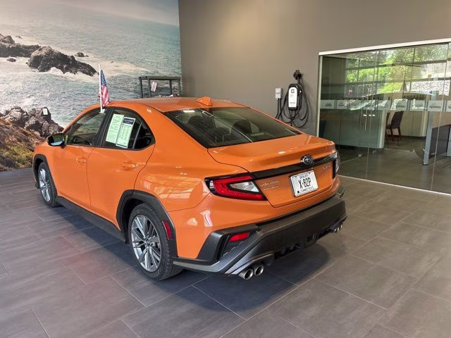 2022 Solar Orange Pearl Subaru WRX Base AWD Sedan