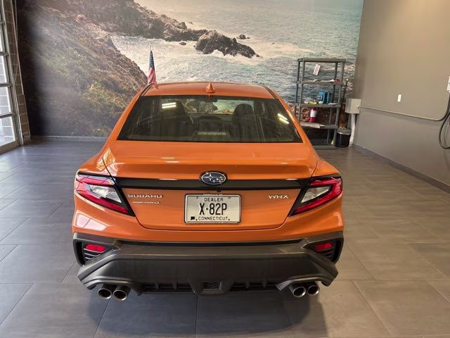 2022 Solar Orange Pearl Subaru WRX Base AWD Sedan