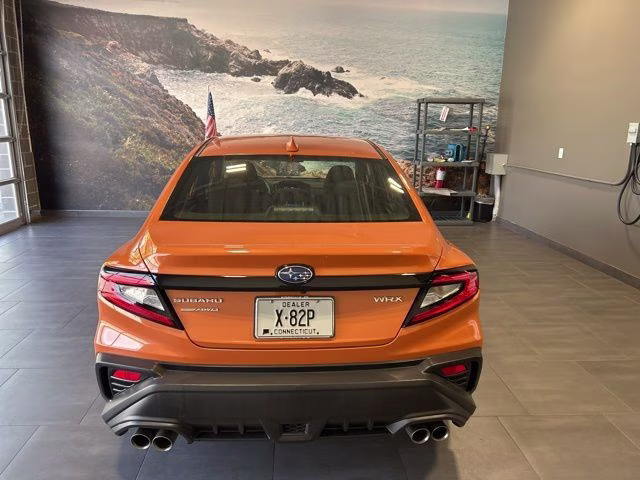 2022 Solar Orange Pearl Subaru WRX Base AWD Sedan