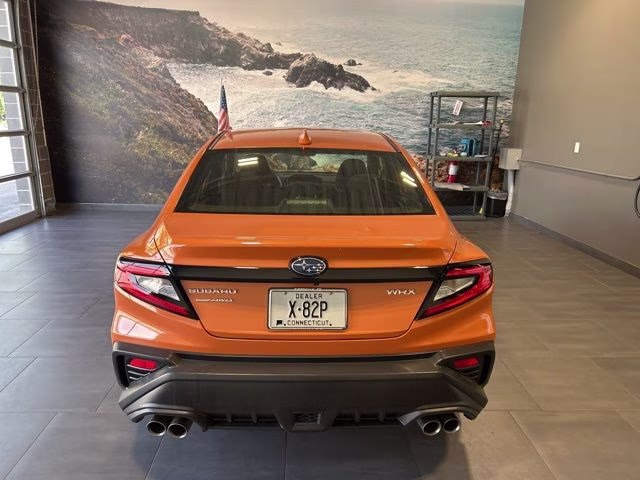 2022 Solar Orange Pearl Subaru WRX Base AWD Sedan