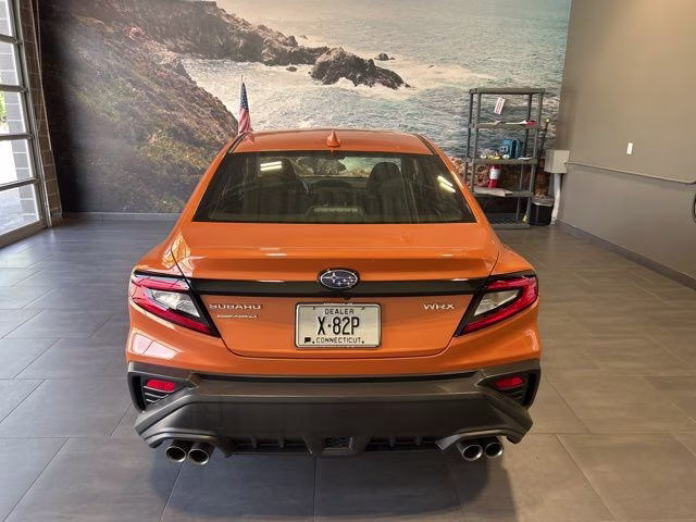2022 Solar Orange Pearl Subaru WRX Base AWD Sedan