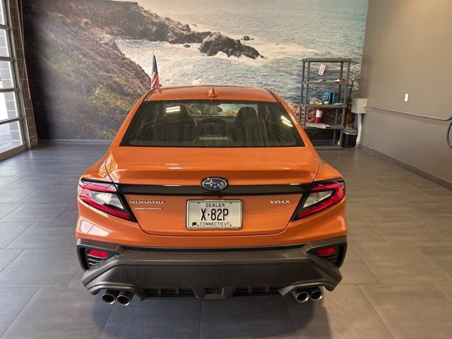 2022 Solar Orange Pearl Subaru WRX Base AWD Sedan