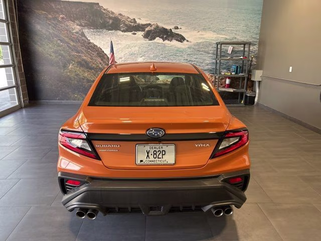 2022 Solar Orange Pearl Subaru WRX Base AWD Sedan